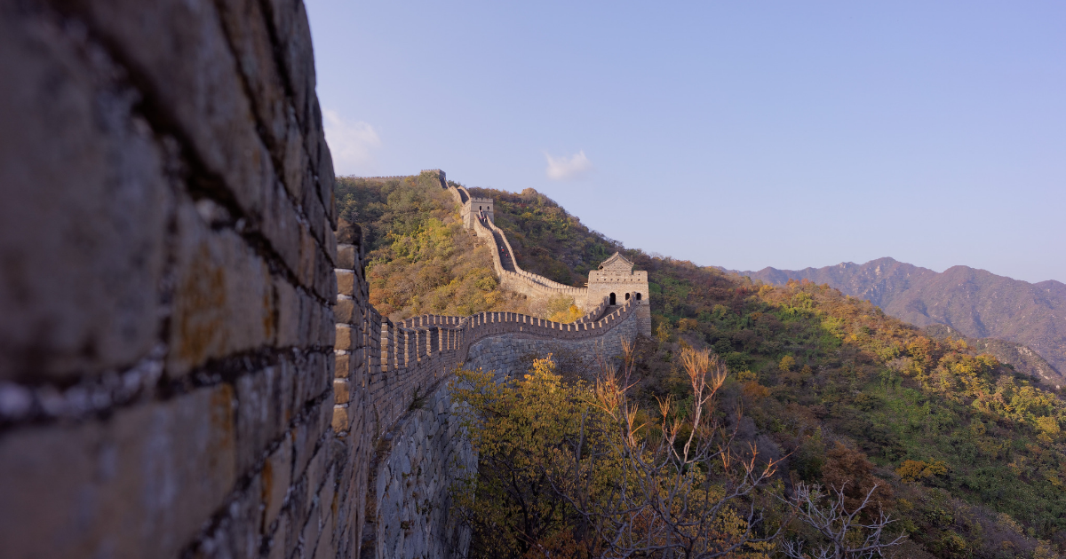 The great wall of china winding through the countryside